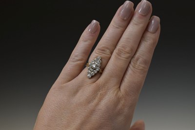 Lot 11 - Early 20th century diamond marquise yellow metal ring