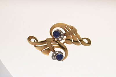 Lot 44 - Sapphire and diamond scroll brooch