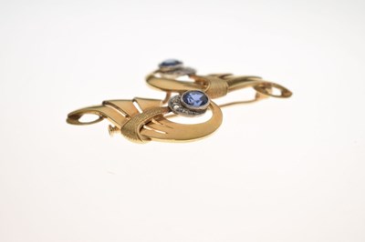 Lot 44 - Sapphire and diamond scroll brooch