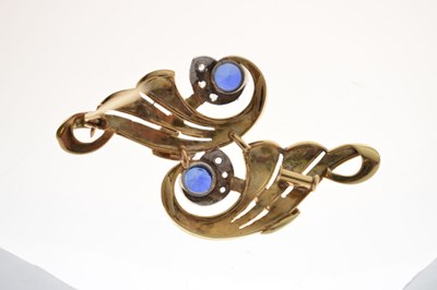 Lot 44 - Sapphire and diamond scroll brooch