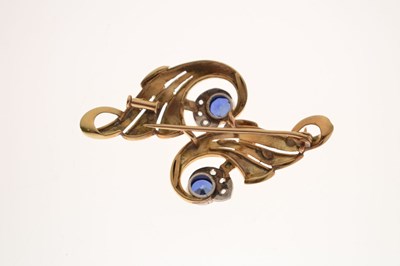 Lot 44 - Sapphire and diamond scroll brooch
