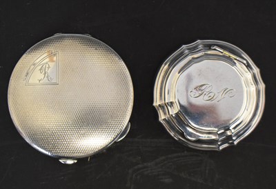 Lot 221 - George VI silver cased compact, together with a white metal circular pill box