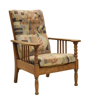 Lot 486 - Early 20th century Arts and Crafts style oak-framed reclining armchair