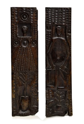 Lot 256 - Unusual pair of early Dutch carved wooden figural panels, one with set square and dividers