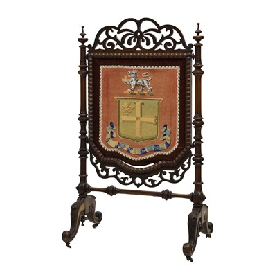 Lot 488 - Mid Victorian mahogany armorial firescreen