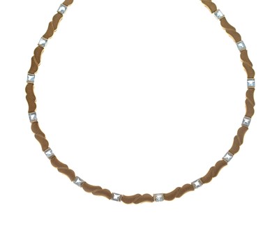 Lot 71 - Blue topaz yellow and white metal collar necklace