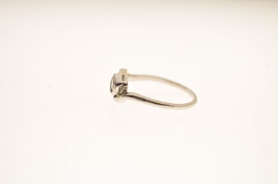 Lot 5 - Diamond two stone unmarked white metal crossover ring