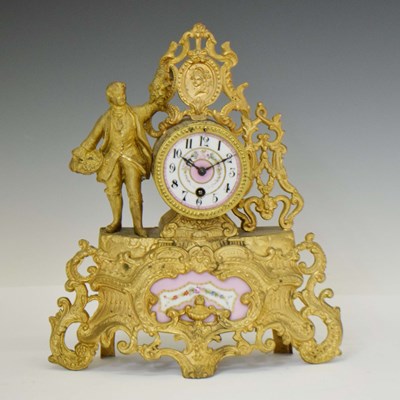 Lot 692 - Late 19th century French porcelain and gilt spelter figural mantel clock