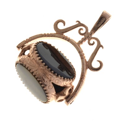 Lot 98 - 9ct rose gold swivel fob seal set three handstone panels