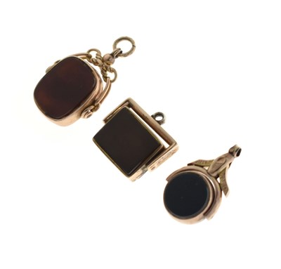 Lot 105 - Three 9ct gold swivel fob seals