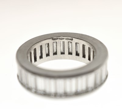 Lot 13 - Baguette cut diamond platinum eternity ring