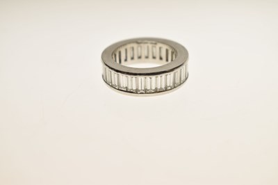 Lot 13 - Baguette cut diamond platinum eternity ring