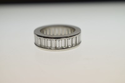 Lot 13 - Baguette cut diamond platinum eternity ring