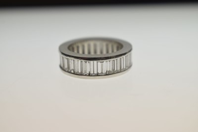 Lot 13 - Baguette cut diamond platinum eternity ring
