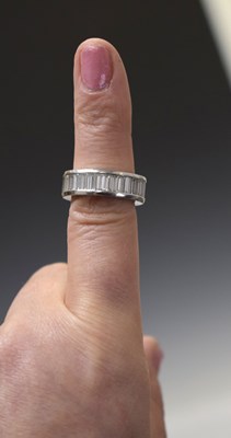 Lot 13 - Baguette cut diamond platinum eternity ring