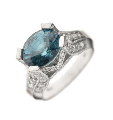Lot 31 - 'Glacier Ice' blue zircon and diamond white metal ring