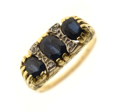 Lot 34 - Green sapphire and diamond dress ring, stamped '18ct'
