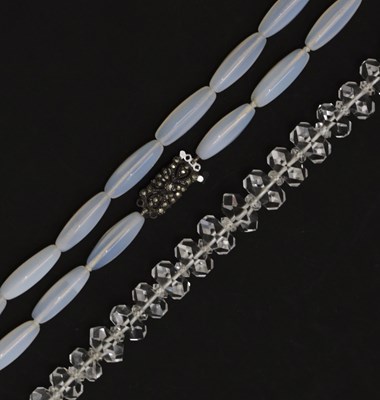 Lot 134 - Graduated rock crystal necklace together with an opalite bead necklace