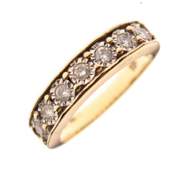 Lot 3 - 9ct gold half-eternity ring illusion-set seven diamonds