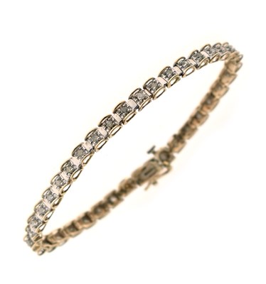 Lot 150 - 9ct yellow and white gold diamond line bracelet