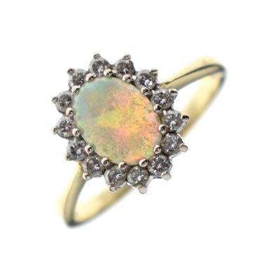 Lot 39 - Opal and diamond 18ct gold cluster ring