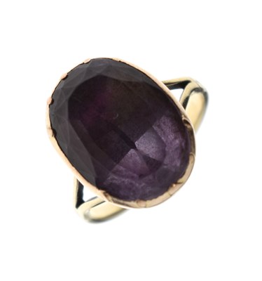 Lot 66 - Amethyst unmarked yellow metal ring
