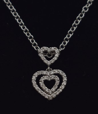 Lot 127 - Gemporia - 9ct white gold diamond set heart necklace