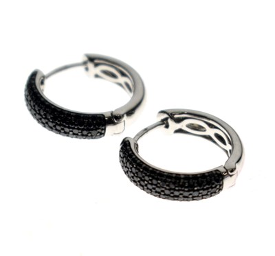 Lot 170 - Pair of black diamond 9ct white gold hoop earrings
