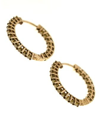 Lot 168 - Pair of yellow diamond 9ct gold hoop earrings