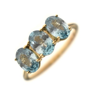 Lot 43 - Blue zircon three-stone 9ct gold ring