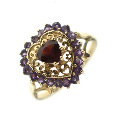 Lot 51 - Garnet and amethyst heart-shaped 9ct gold dress ring