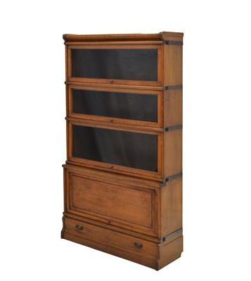Lot 768 - Globe Wernicke oak four-section modular bookcase