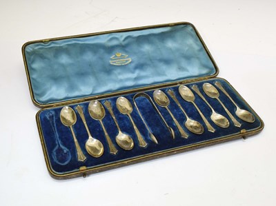 Lot 279 - Late Victorian silver cased Albany pattern teaspoons and sugar tongs