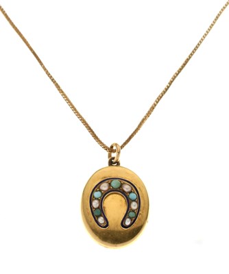 Lot 103 - Yellow metal chain or necklace and a Victorian gilt metal pendant locket (2)