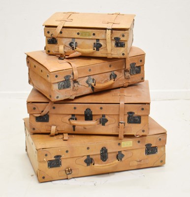 Lot 424 - Set of four vintage tan leather travel luggage suitcases