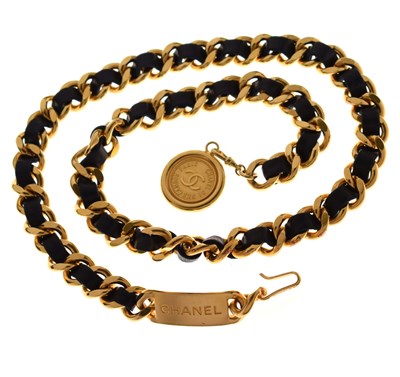 Lot 226 - Chanel - Gilt metal and interwoven black leather chain belt