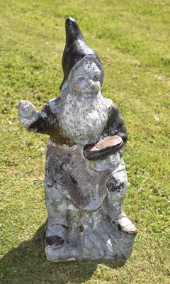 Lot 510 - 20th century composition stone garden gnome cobbler or shoemaker