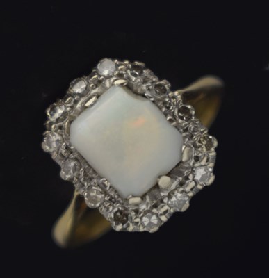 Lot 31 - Opal and diamond 18ct gold cluster ring