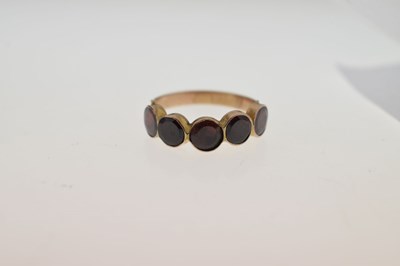 Lot 24 - Georgian garnet foiled unmarked yellow metal ring