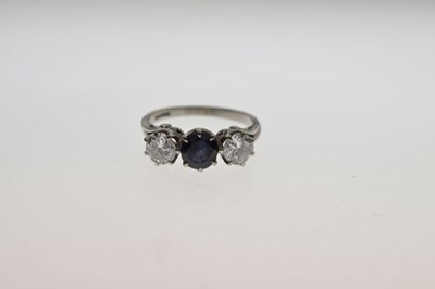 Lot 18 - Sapphire and diamond three stone 18ct white gold ring