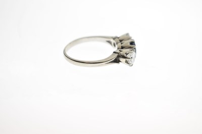 Lot 18 - Sapphire and diamond three stone 18ct white gold ring