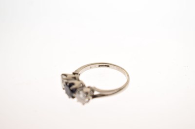 Lot 18 - Sapphire and diamond three stone 18ct white gold ring