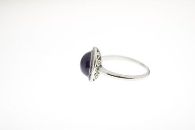 Lot 26 - Early 20th century amethyst and diamond unmarked white metal cluster ring