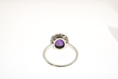 Lot 26 - Early 20th century amethyst and diamond unmarked white metal cluster ring