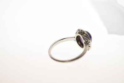 Lot 26 - Early 20th century amethyst and diamond unmarked white metal cluster ring