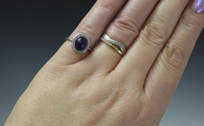 Lot 26 - Early 20th century amethyst and diamond unmarked white metal cluster ring