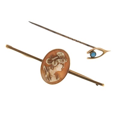 Lot 76 - Cameo bar brooch, stamped '9ct', and a turquoise wishbone stick pin, stamped '15ct'