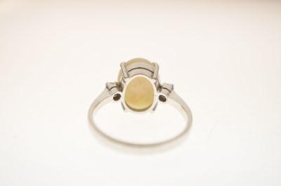 Lot 27 - Opal and diamond white metal dress ring