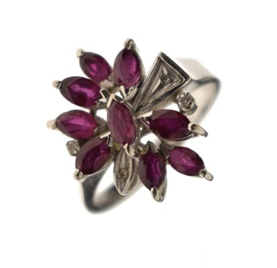Lot 20 - Ruby and diamond white metal dress ring, stamped '585'
