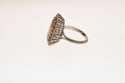 Lot 30 - Imperial topaz and diamond 18ct white gold cluster ring
